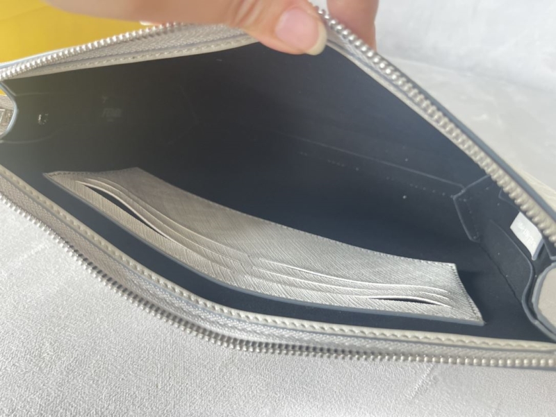 F**di clutch bags